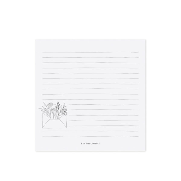 Bloc-notes avec impression en-bas à gauche : enveloppe fleurie