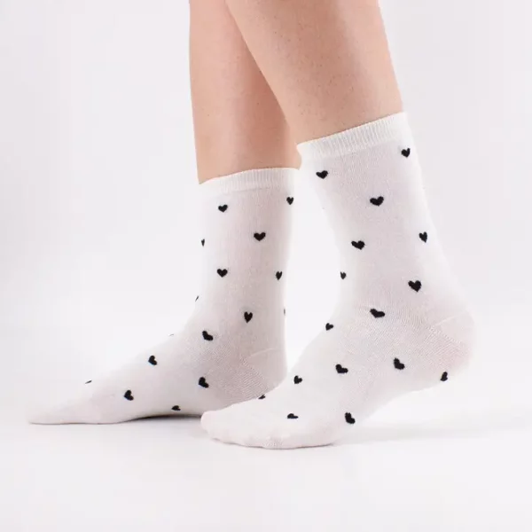 Chaussettes hautes à coeurs noirs