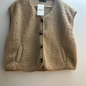 Gilet moumoute taupe