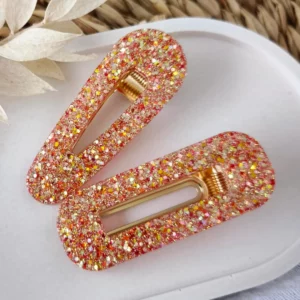 Barrette en résine rouge/reflets